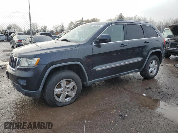 2011 Jeep Grand Cherokee Laredo with VIN 1J4RS4GG8BC508482, listed as a Copart auction lot 79261304 with 208,265 mi miles and Salvage Title. Bid and sale history available at DreamBid. Image 1.