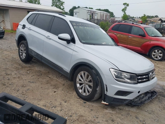 2018 Volkswagen Tiguan S with VIN 3VV1B7AX0JM041120, listed as a IAAI auction lot 42219662 with 160,852 mi miles and . Bid and sale history available at DreamBid. Image 1.