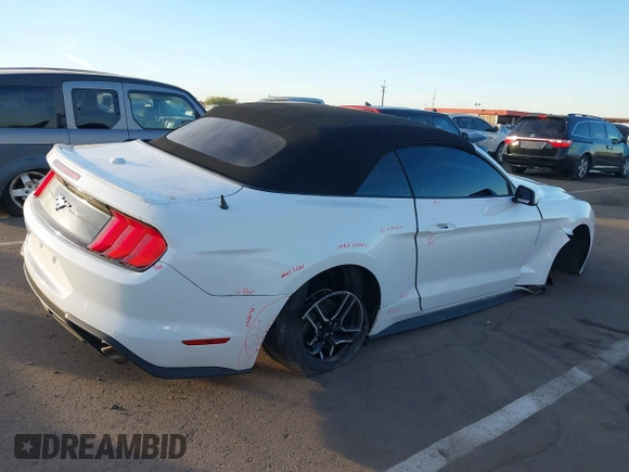 2021 Ford Mustang EcoBoost with VIN 1FATP8UH2M5120338, listed as a IAAI auction lot 40958016 with 76,979 mi miles. Bid and sale history available at carsss.com. Image 4.