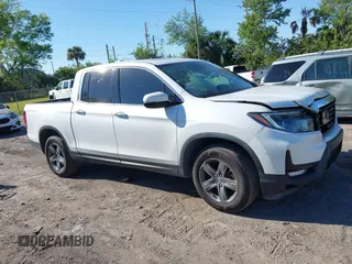2021 Honda Ridgeline RTL-E with VIN 5FPYK3F7XMB011525, listed as a IAAI auction lot 41774012 with 98,031 mi miles and . Bid and sale history available at DreamBid. Image 13.