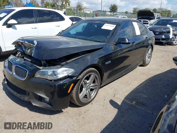 2014 BMW 5 Series 535d with VIN WBAXA5C58ED690447, listed as a IAAI auction lot 41577468 with 149,080 mi miles and . Bid and sale history available at carsss.com. Image 2.