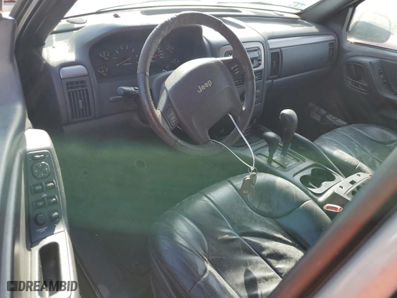 2001 Jeep Grand Cherokee Laredo with VIN 1J4GW48N01C682814, listed as a Copart auction lot 76239634 with 0 mi miles and Salvage Title. Bid and sale history available at carsss.com. Image 8.