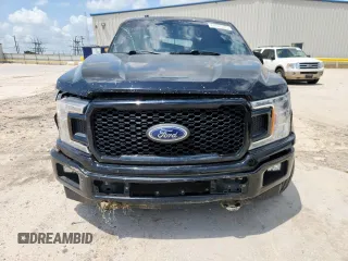 2018 Ford F-150 XL with VIN 1FTEW1E57JFC39493, listed as a Copart auction lot 61781395 with 129,871 mi miles and Salvage title. Bid and sale history available at DreamBid. Image 5.