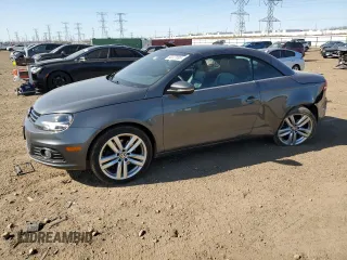 2012 Volkswagen Eos Executive with VIN WVWFW7AH0CV002201, listed as a Copart auction lot 52227695 with 96,726 mi miles and Salvage title. Bid and sale history available at DreamBid. Image 1.