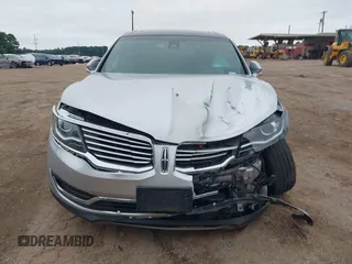 2018 Lincoln MKX Reserve z VIN 2LMPJ6LR1JBL30318, wystawiony jako IAAI lot #42204680 z przebiegiem 94 903 mil mil oraz . Historia ofert i sprzedaży dostępna na DreamBid. Obrazek 12.