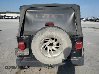 1998 Jeep Wrangler Sport with VIN 1J4FY19S1WP757593, listed as a Copart auction lot 52382945 with 230,086 mi miles and Salvage Title. Bid and sale history available at carsss.com. Image 6.