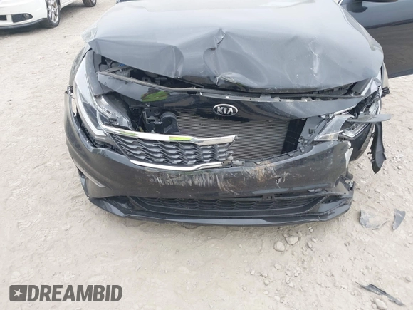 2020 Kia Optima LX with VIN 5XXGT4L37LG445597, listed as a IAAI auction lot 42404651 with 56,851 mi miles and . Bid and sale history available at DreamBid. Image 6.