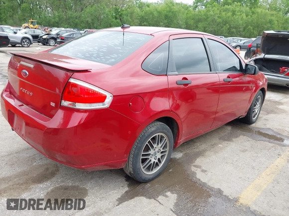 2010 Ford Focus SE with VIN 1FAHP3FN5AW160169, listed as a IAAI auction lot 42136904 with 146,605 mi miles. Bid and sale history available at carsss.com. Image 4.