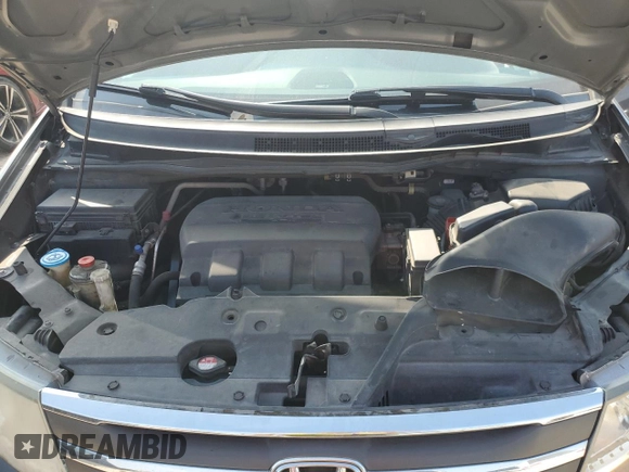 2011 Honda Odyssey EX-L with VIN 5FNRL5H64BB082596, listed as a Copart auction lot 51474935 with 184,408 mi miles and Salvage Title. Bid and sale history available at DreamBid. Image 12.