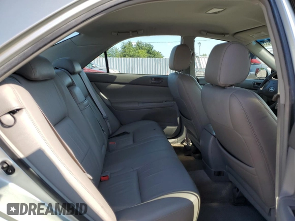 2004 Toyota Camry LE z VIN JTDBE32K640270298, wystawiony jako Copart lot #58800955 z przebiegiem 79 064 mil mil oraz Szkoda całkowita • Salvage title. Historia ofert i sprzedaży dostępna na DreamBid. Obrazek 10.