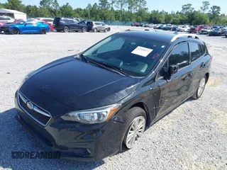 2017 Subaru Impreza Premium with VIN 4S3GTAD63H3722339, listed as a IAAI auction lot 42530573 with 120,114 mi miles and . Bid and sale history available at DreamBid. Image 2.