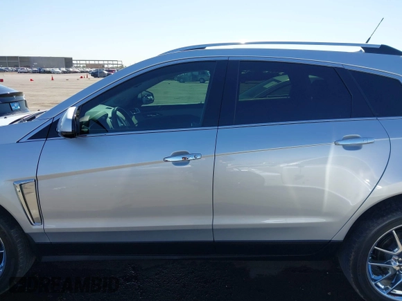 2013 Cadillac SRX Premium Collection z VIN 3GYFNEE36DS556446, wystawiony jako IAAI lot #42289824 z przebiegiem 23 988 mil mil oraz . Historia ofert i sprzedaży dostępna na DreamBid. Obrazek 15.