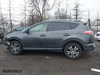 2018 Toyota RAV4 LE with VIN JTMBFREV0JJ223957, listed as a IAAI auction lot 41652810 with 144,629 mi miles. Bid and sale history available at carsss.com. Image 14.