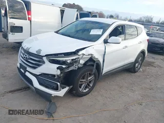 2017 Hyundai Santa Fe 2.4L z VIN 5XYZT3LB2HG412388, wystawiony jako IAAI lot #41174620 z przebiegiem 122 237 mil mil oraz . Historia ofert i sprzedaży dostępna na DreamBid. Obrazek 2.