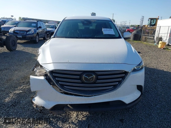 2018 Mazda CX-9 Touring z VIN JM3TCBCY3J0223076, wystawiony jako IAAI lot #42099819 z przebiegiem 160 097 mil mil oraz . Historia ofert i sprzedaży dostępna na DreamBid. Obrazek 13.