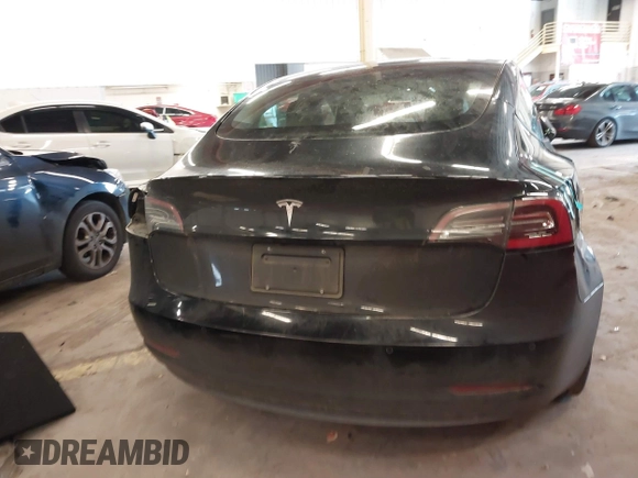 2022 Tesla Model 3 with VIN 5YJ3E1EA4NF187113, listed as a IAAI auction lot 41712331 with 81,879 mi miles and . Bid and sale history available at DreamBid. Image 17.