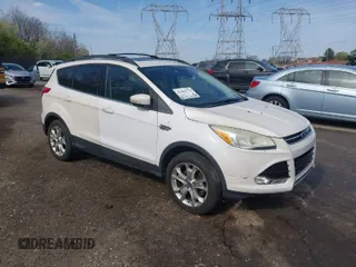 2013 Ford Escape SEL with VIN 1FMCU9H93DUD06886, listed as a IAAI auction lot 41881374 with 116,636 mi miles. Bid and sale history available at carsss.com. Image 1.