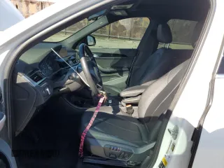 2018 BMW X1 xDrive28i with VIN WBXHT3C34J5K26230, listed as a Copart auction lot 50069465 with 89,520 mi miles and Salvage Title. Bid and sale history available at carsss.com. Image 7.