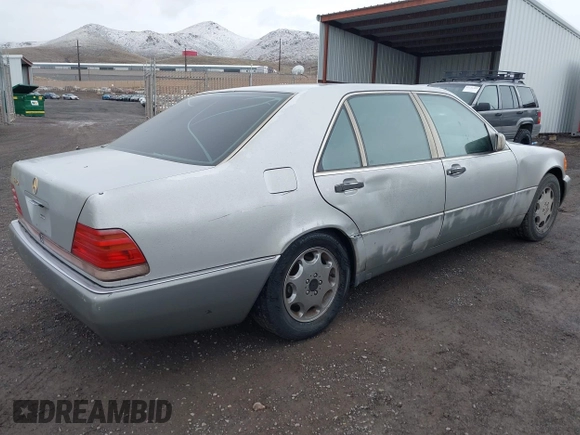 1994 Mercedes-Benz S with VIN WDBGA43E0RA162923, listed as a IAAI auction lot 42012249 with 107,498 mi miles and . Bid and sale history available at DreamBid. Image 4.
