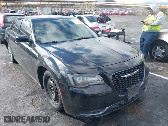 2018 Chrysler 300 with VIN 2C3CCABGXJH239934, listed as a IAAI auction lot 41517944 with 140,699 mi miles. Bid and sale history available at carsss.com. Image 1.
