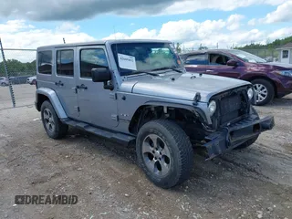 2018 Jeep Wrangler Unlimited Sahara with VIN 1C4BJWEGXJL806832, listed as a IAAI auction lot 42605892 with 90,535 mi miles and . Bid and sale history available at DreamBid. Image 1.