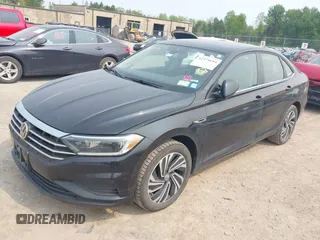 2020 Volkswagen Jetta SEL z VIN 3VWEB7BU9LM023817, wystawiony jako IAAI lot #42371694 z przebiegiem 99 100 mil mil oraz . Historia ofert i sprzedaży dostępna na DreamBid. Obrazek 17.