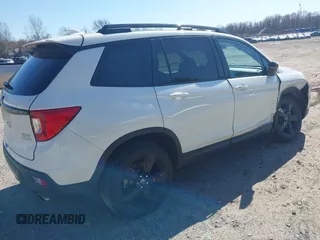 2019 Honda Passport Elite z VIN 5FNYF8H04KB005307, wystawiony jako IAAI lot #41828725 z przebiegiem 61 864 mil mil oraz . Historia ofert i sprzedaży dostępna na DreamBid. Obrazek 4.