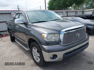 2011 Toyota Tundra with VIN 5TFRM5F1XBX023689, listed as a IAAI auction lot 42572414 with 202,908 mi miles and . Bid and sale history available at DreamBid. Image 1.