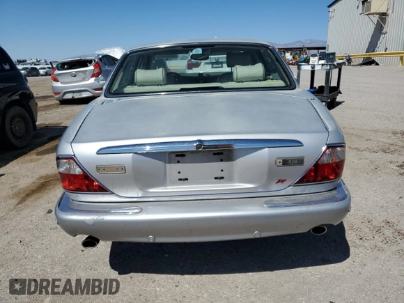 2003 Jaguar XJ 8 z VIN SAJDA14C23LF59484, wystawiony jako Copart lot #50304475 z przebiegiem Nie podano mil oraz Czysty tytuł • Clean title. Historia ofert i sprzedaży dostępna na DreamBid. Obrazek 6.