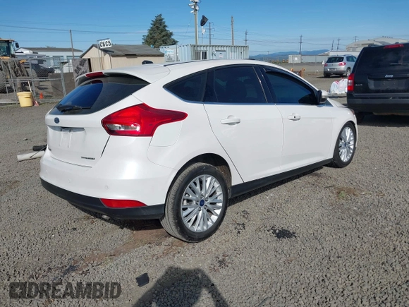 2017 Ford Focus Titanium with VIN 1FADP3N24HL308751, listed as a IAAI auction lot 42207247 with 109,736 mi miles and . Bid and sale history available at DreamBid. Image 4.