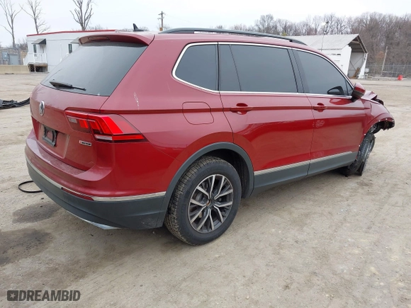 2020 Volkswagen Tiguan SE with VIN 3VV2B7AX2LM018722, listed as a IAAI auction lot 41802291 with 58,914 mi miles. Bid and sale history available at carsss.com. Image 4.
