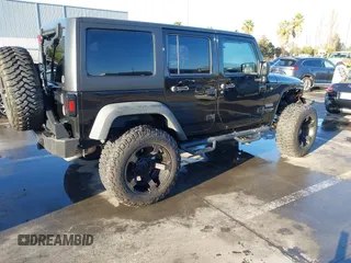 2018 Jeep Wrangler JK Unlimited Sport S with VIN 1C4BJWDG7JL818843, listed as a IAAI auction lot 41506058 with 43,563 mi miles. Bid and sale history available at carsss.com. Image 4.