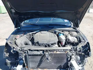 2019 Audi A5 Premium Plus with VIN WAUTNAF54KA026957, listed as a IAAI auction lot 41744015 with 94,506 mi miles and . Bid and sale history available at DreamBid. Image 10.