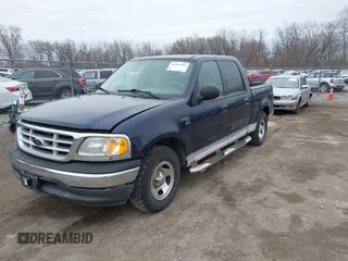 2003 Ford F-150 XLT with VIN 1FTRW07L63KD51221, listed as a IAAI auction lot 41883942 with Not Provided miles. Bid and sale history available at carsss.com. Image 2.