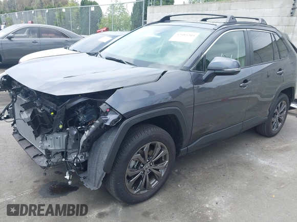 2024 Toyota RAV4 Hybrid XLE Premium z VIN JTMB6RFV5RJ059437, wystawiony jako IAAI lot #42485203 z przebiegiem 4 200 mil mil oraz . Historia ofert i sprzedaży dostępna na DreamBid. Obrazek 19.