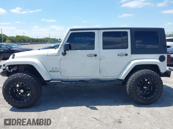 2010 Jeep Wrangler z VIN 1J4HB5H16AL186600, wystawiony jako IAAI lot #42147992 z przebiegiem 134 717 mil mil oraz . Historia ofert i sprzedaży dostępna na DreamBid. Obrazek 14.