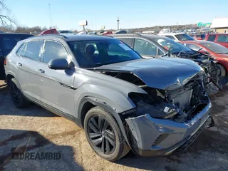 2021 Volkswagen Atlas SEL Premium z VIN 1V2TE2CAXMC215550, wystawiony jako IAAI lot #41579665 z przebiegiem 55 264 mil mil oraz . Historia ofert i sprzedaży dostępna na DreamBid. Obrazek 1.