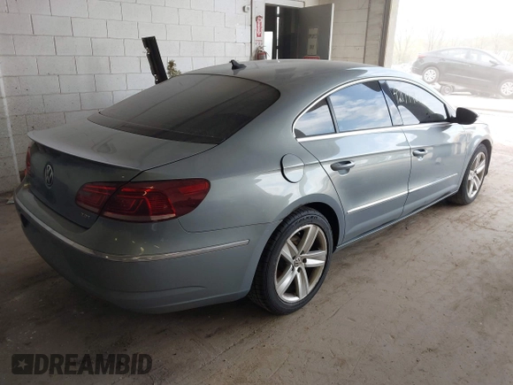 2013 Volkswagen CC Sport with VIN WVWBP7AN1DE567561, listed as a IAAI auction lot 42174906 with 157,827 mi miles. Bid and sale history available at carsss.com. Image 4.