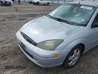 2003 Ford Focus ZTS с VIN 1FAFP38393W136835, выставлен на аукционе Copart как лот 59043635 с пробегом 188 538 миль миль и Списание • Salvage title. История ставок и продаж доступна на DreamBid. Изображение 14.