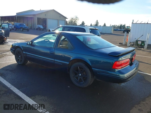 1996 Ford Thunderbird LX z VIN 1FALP62W1TH100925, wystawiony jako IAAI lot #41289811 z przebiegiem 84 056 mil mil oraz . Historia ofert i sprzedaży dostępna na DreamBid. Obrazek 3.