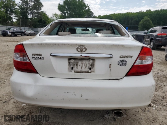 2004 Toyota Camry LE z VIN JTDBE32K440281087, wystawiony jako Copart lot #60486995 z przebiegiem 229 856 mil mil oraz Czysty tytuł • Clean title. Historia ofert i sprzedaży dostępna na DreamBid. Obrazek 7.