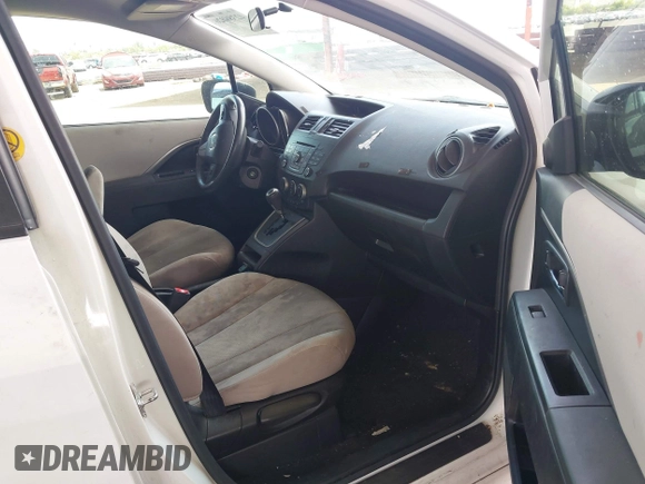 2013 Mazda 5 Touring with VIN JM1CW2CL0D0159894, listed as a IAAI auction lot 42386026 with 121,879 mi miles and . Bid and sale history available at DreamBid. Image 5.