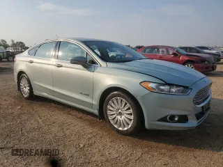 2014 Ford Fusion SE Hybrid with VIN 3FA6P0LU4ER106386, listed as a Copart auction lot 59627565 with 105,855 mi miles and Salvage title. Bid and sale history available at DreamBid. Image 4.