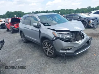 2017 Honda Pilot Elite with VIN 5FNYF6H03HB055693, listed as a IAAI auction lot 42659562 with 153,153 mi miles and . Bid and sale history available at DreamBid. Image 1.