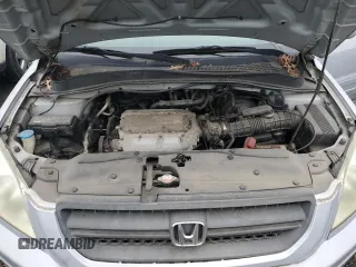 2003 Honda Pilot EX z VIN 2HKYF18763H581343, wystawiony jako Copart lot #60804525 z przebiegiem 236 636 mil mil oraz Szkoda całkowita • Salvage title. Historia ofert i sprzedaży dostępna na DreamBid. Obrazek 12.