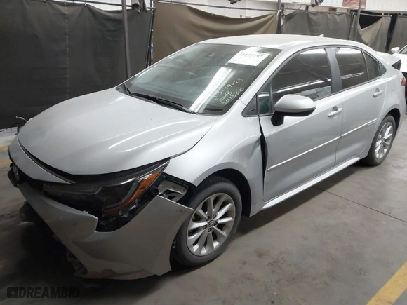 2022 Toyota Corolla LE with VIN 5YFVPMAEXNP301360, listed as a IAAI auction lot 41877797 with 12,404 mi miles. Bid and sale history available at carsss.com. Image 2.