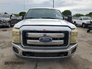 2012 Ford F-250 XL with VIN 1FT7X2A61CEC15533, listed as a Copart auction lot 57883444 with 195,030 mi miles and Salvage title. Bid and sale history available at DreamBid. Image 5.