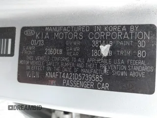 2013 Kia Forte LX with VIN KNAFT4A21D5739585, listed as a IAAI auction lot 42097213 with 195,500 mi miles. Bid and sale history available at carsss.com. Image 9.