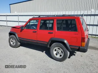1995 Jeep Cherokee Sport with VIN 1J4FJ68S2SL666126, listed as a Copart auction lot 50496735 with 158,523 mi miles and Salvage title. Bid and sale history available at DreamBid. Image 2.