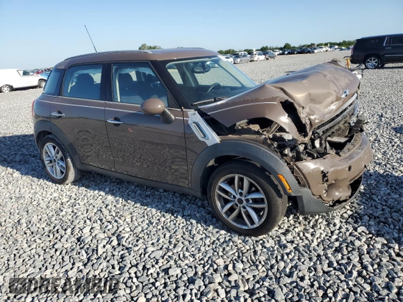 2011 MINI Countryman with VIN WMWZB3C53BWM00724, listed as a Copart auction lot 52293575 with Not Provided miles and Salvage Title. Bid and sale history available at DreamBid. Image 4.